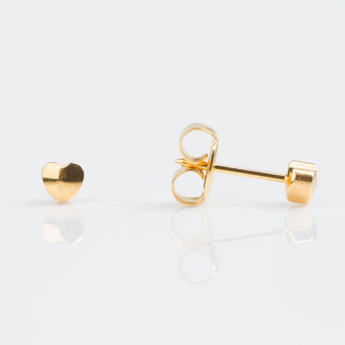 Aretes corazón dorado